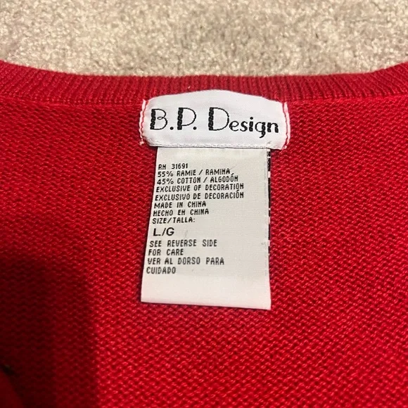 Vintage Red Christmas Cardigan with Nutcracker Design - Picture 2 of 7